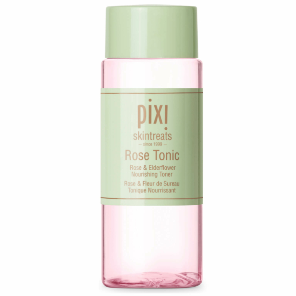 Le flacon de PIXI Rose Tonic Tonique Nourrissant 100 ml arbore un design rose clair sophistiqué, complété par une étiquette et un bouchon verts. L'étiquette affiche « Pixi Skintreats Rose Tonic Rose & Elderflower Nourishing Toner », mettant l'accent sur son mélange apaisant pour une peau rafraîchie. Dakar