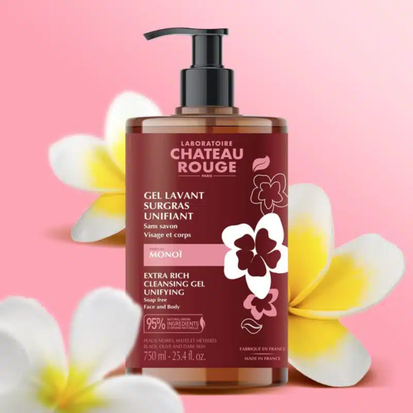 Flacon de Château Rouge GEL LAVANT Monoï (3 senteurs) format familial 750 ml à décor de fleurs sur fond rose. Le texte sur le flacon est en français et en anglais. dakar