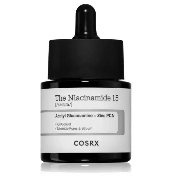 Un flacon compte-gouttes noir étiqueté « Cosrx The Niacinamide 15 Sérum léger Anti-Imperfections 20 ml »