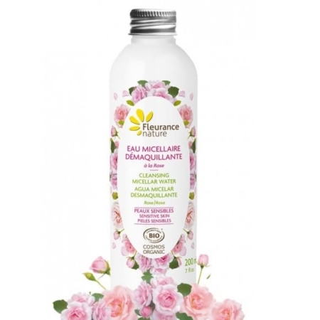 Un flacon de Fleurance Nature Eau micellaire démaquillante à la Rose 200 ml, arborant un motif de rose sur l'étiquette et l'emballage, met en avant sa certification biologique et sa douceur pour les peaux sensibles. Orné de roses roses, il incarne la beauté de Dakar et reflète l'élégance naturelle du Sénégal. Dakar