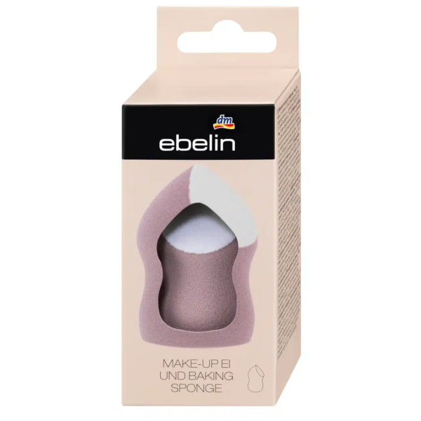 Mélangeur poudre et maquillage Ebelin Blender, 1 pièce, emballé avec l'inspiration des couleurs vibrantes de Dakar, Sénégal. La boîte de couleur crème aux accents noirs et bruns comporte une fenêtre mettant en valeur la texture douce et la teinte violette du produit. Dakar