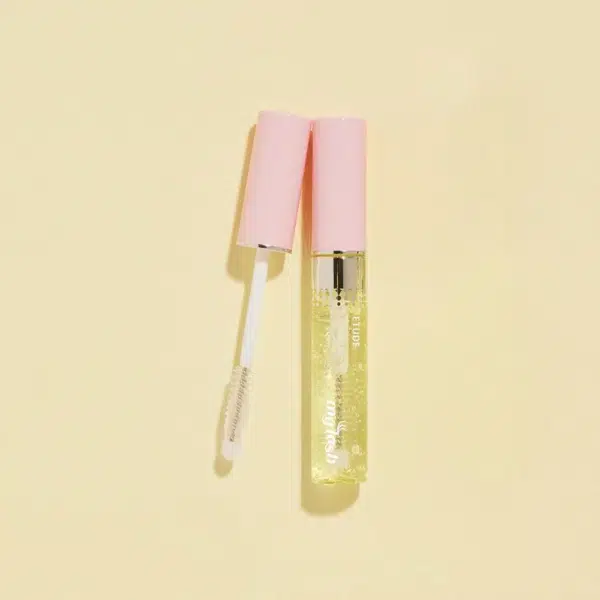 Tube de gloss transparent au capuchon rose