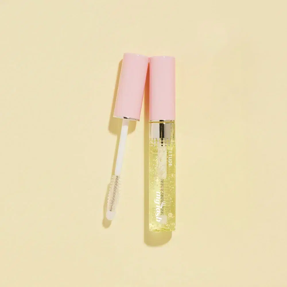 Tube de gloss transparent au capuchon rose