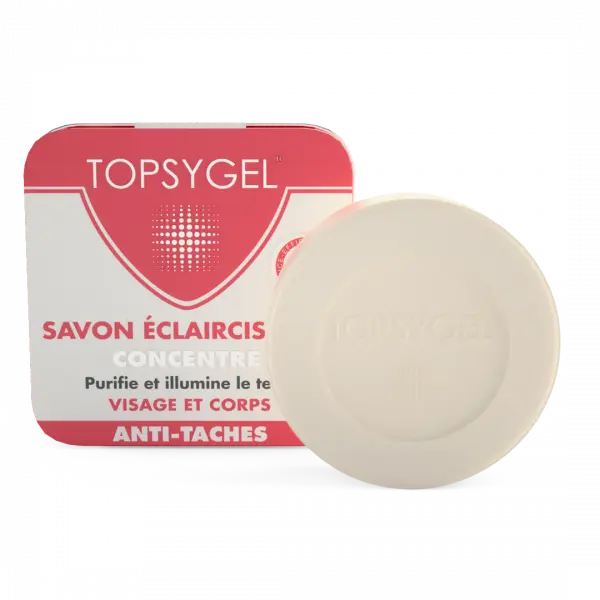 Barre de savon ronde avec emballage rouge et blanc portant le texte français « HT26 TOPSYGEL Savon éclaircissant 150g