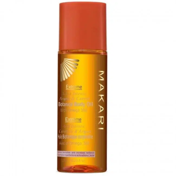 Un flacon de Makari Extreme Argan and Carrot Huile hydratante pour le corps 125 ml est présenté sur un fond blanc.