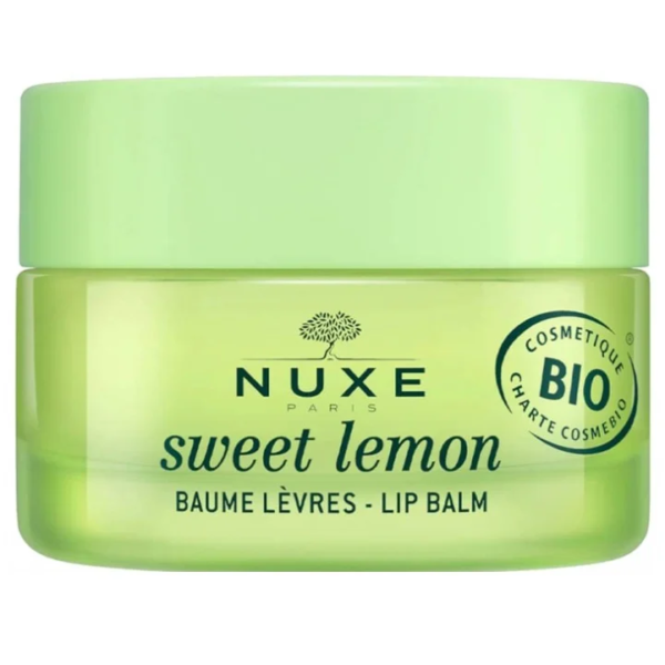 Un pot vert de Nuxe Sweet Lemon Baume Lèvres Bio 15 g affiche fièrement l'étiquette « Cosmétique Bio »