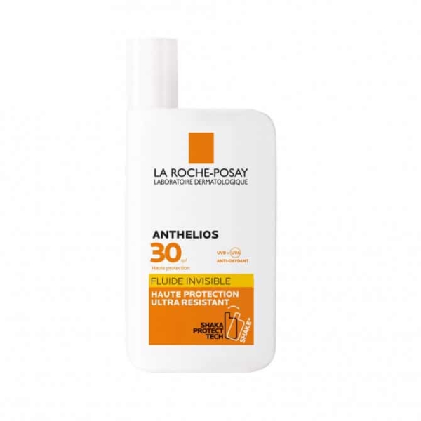 Image d'un flacon blanc de crème solaire LA ROCHE-POSAY Anthelios SPF30 Fluide Invisible Avec Parfum, format 50 ml. L'étiquette est orange et blanche, mettant en valeur le texte « Fluide Invisible Haute Protection Ultra Résistant ». Le flacon affiche bien en évidence le logo « Shake Protect Tech ». Dakar