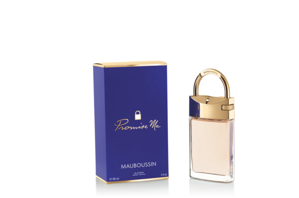 Un flacon de 90 ml d'Eau de Parfum CHYPRÉ MODERNE Mauboussin Promise Me trône élégamment à côté de son coffret bleu et or