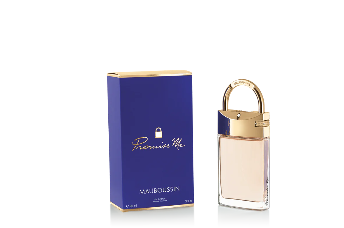 Un flacon de 90 ml d'Eau de Parfum CHYPRÉ MODERNE Mauboussin Promise Me trône élégamment à côté de son coffret bleu et or