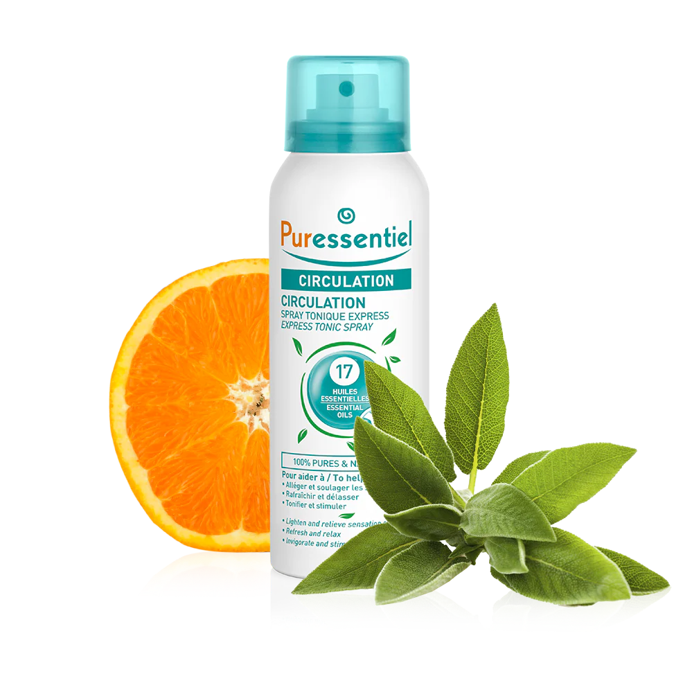 Un flacon de Puressentiel Spray Tonique Express Circulation Pour Alleger et Soulager Les Sensations de Jambes Lourdes 100 ml avec une tranche d'orange et des feuilles vertes en arrière-plan. dakar