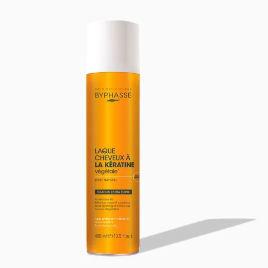 Spray orange BYPHASSE Laque Cheveux Effet Naturel Fixation Extra Forte 400ml à la kératine sur fond blanc. dakar