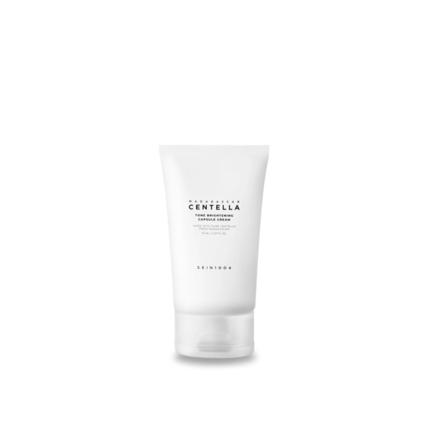 Un tube blanc étiqueté « Skin1004 Tone Brightening Capsule Cream d'équilibrage du tonus de la peau 75 ml » sur un fond blanc immaculé