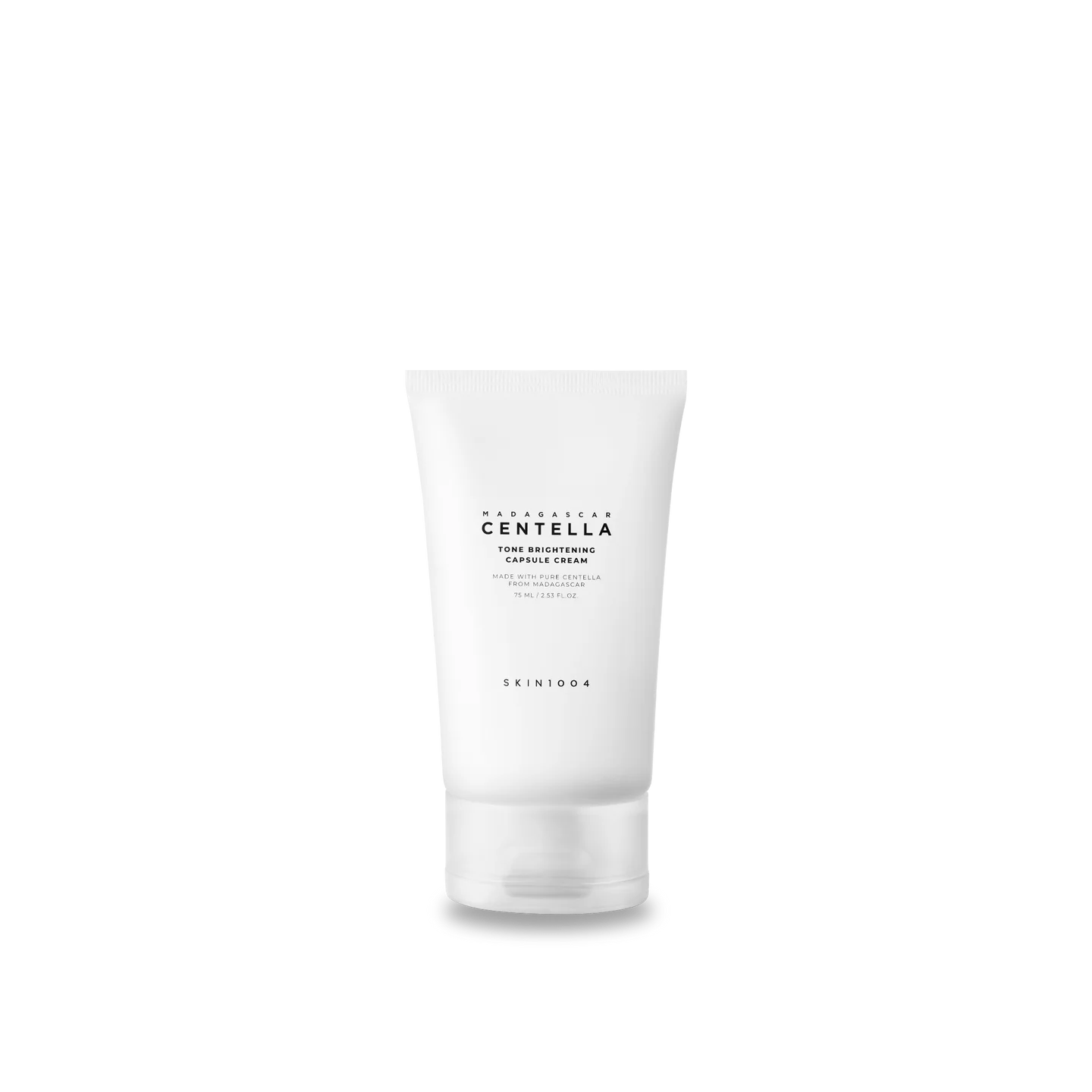 Un tube blanc étiqueté « Skin1004 Tone Brightening Capsule Cream d'équilibrage du tonus de la peau 75 ml » sur un fond blanc immaculé