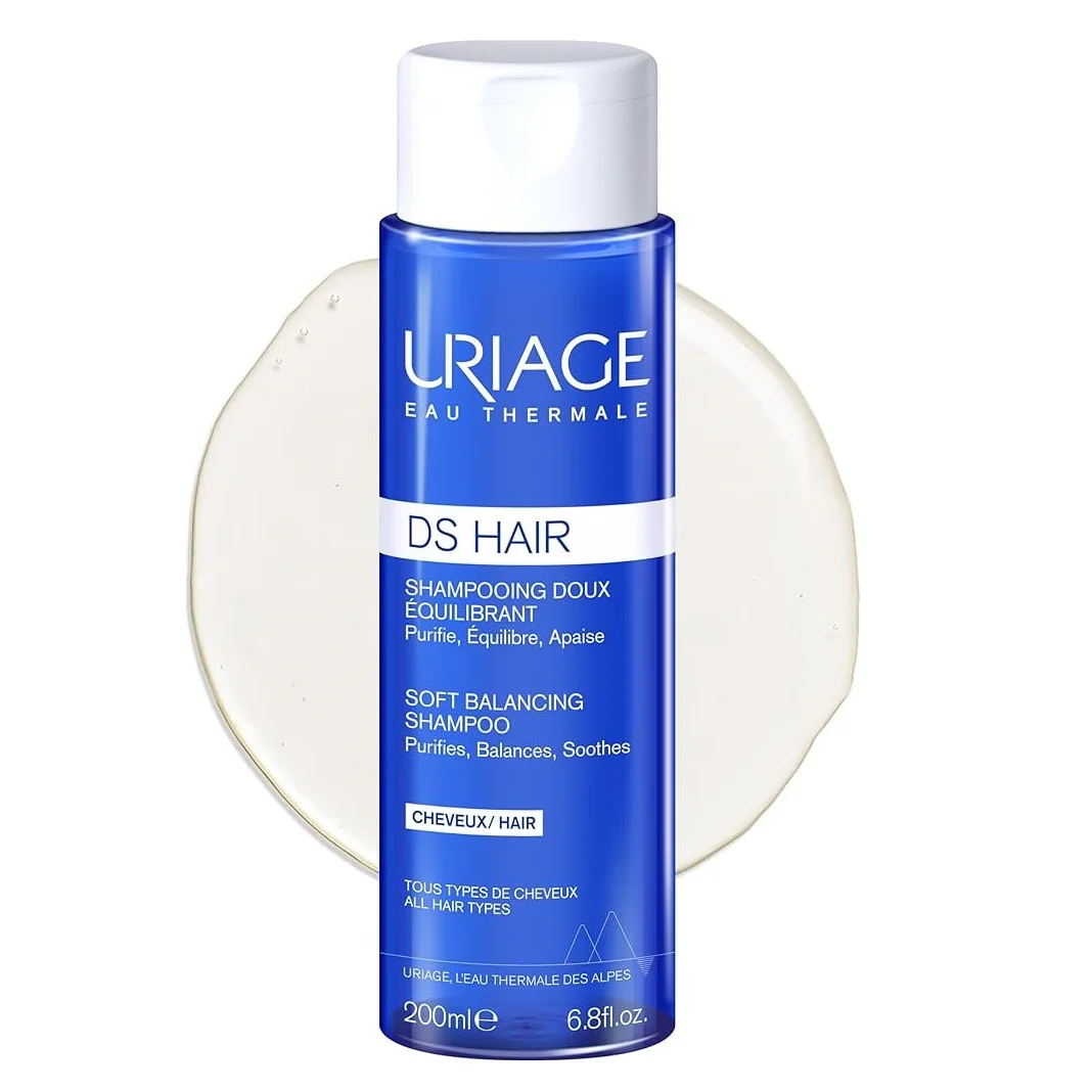 Une bouteille bleue de Uriage DS Hair Shampooing Apaisant Doux Équilibrant Soins Peaux Irritées et Sensibles 200 ml