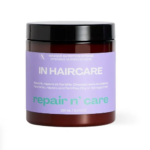 Un pot de 250 ml de InHairCare Masque Intense Repair n' Care Nourrit Repare Fortifie conçu pour les cheveux secs ou abîmés, doté d'une étiquette violette avec un texte blanc et vert mettant l'accent sur « repair n' care », et logé dans un récipient marron avec un couvercle noir. Dakar